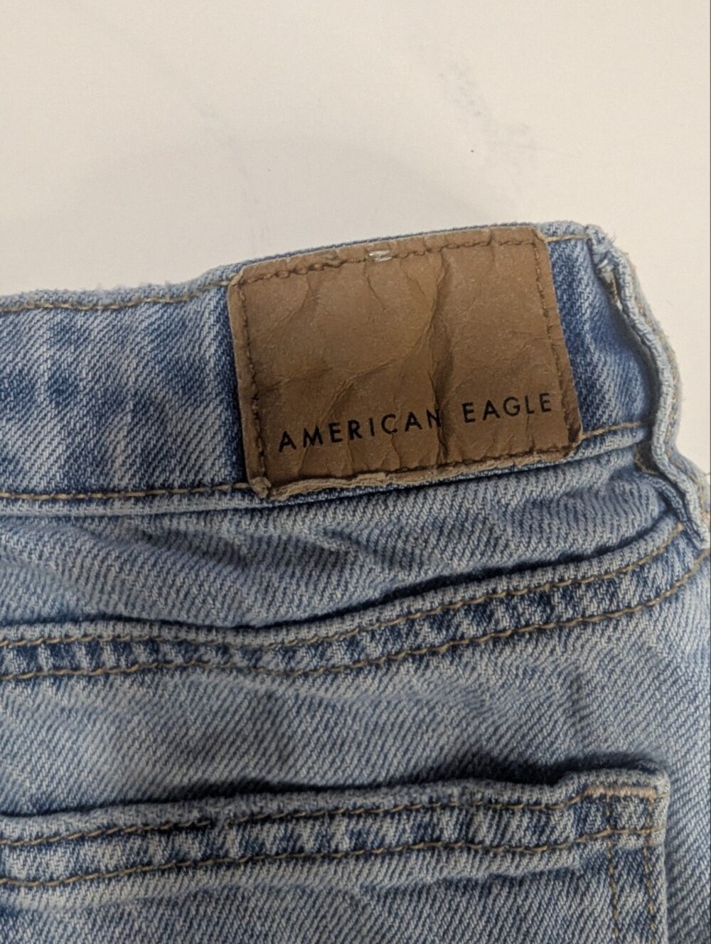 American Eagle Jean Mini Skirt Women's Size 0 Light Wash Denim Cut Off Y2K - Picture 9 of 10